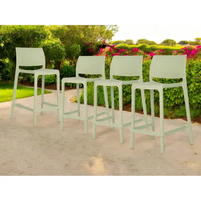 HomeRoots Set of Four 26  Green Heavy Duty Plastic Low Back Outdoor Counter Height Bar Chairs